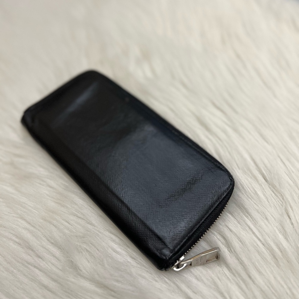 LOUIS VUITTON - BLACK TAIGA LEATHER LONG ZIP WALLET - Picture 4 of 10